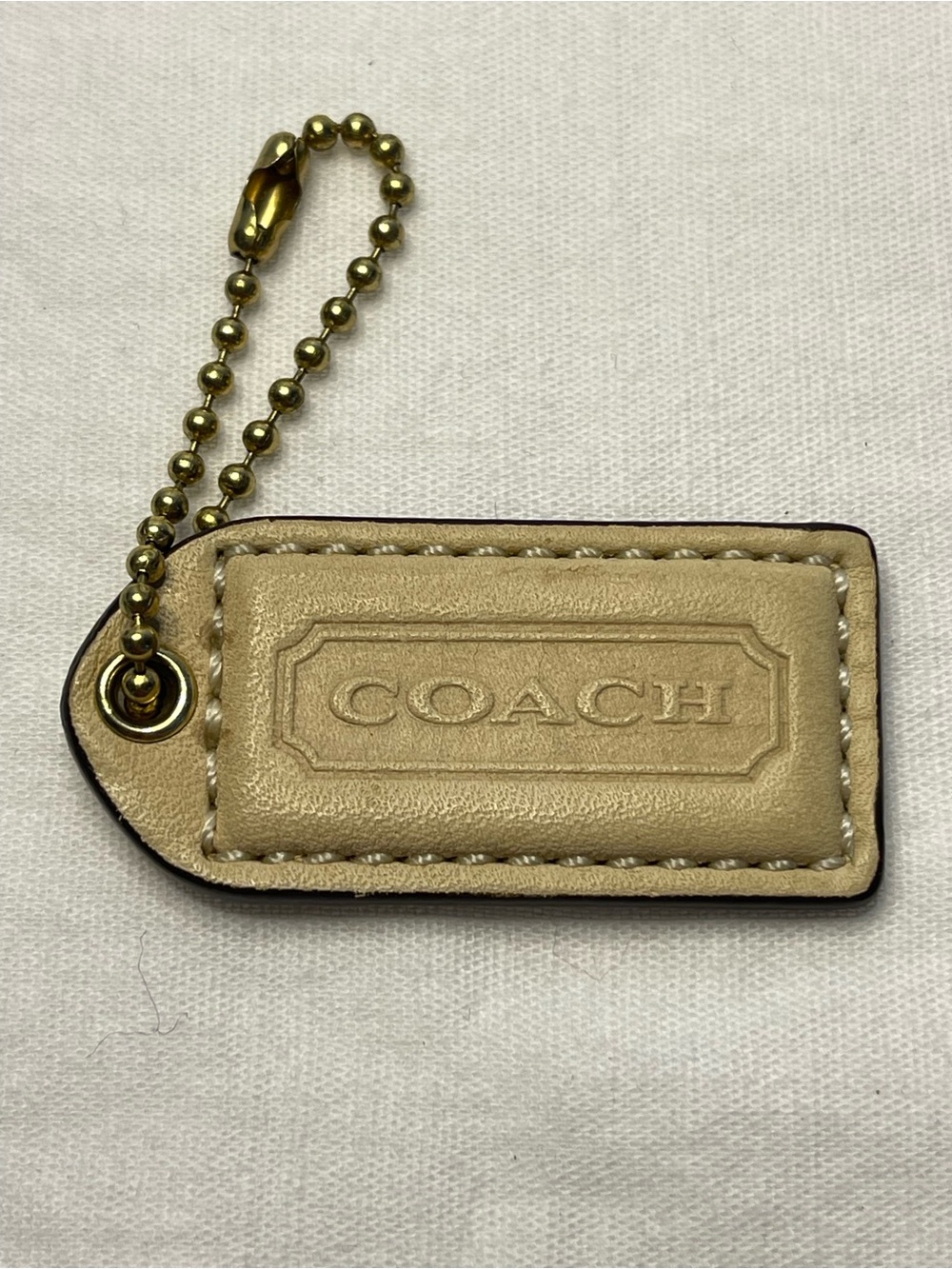 Coach Cream Leather Hang Tag with Gold Ball Chain